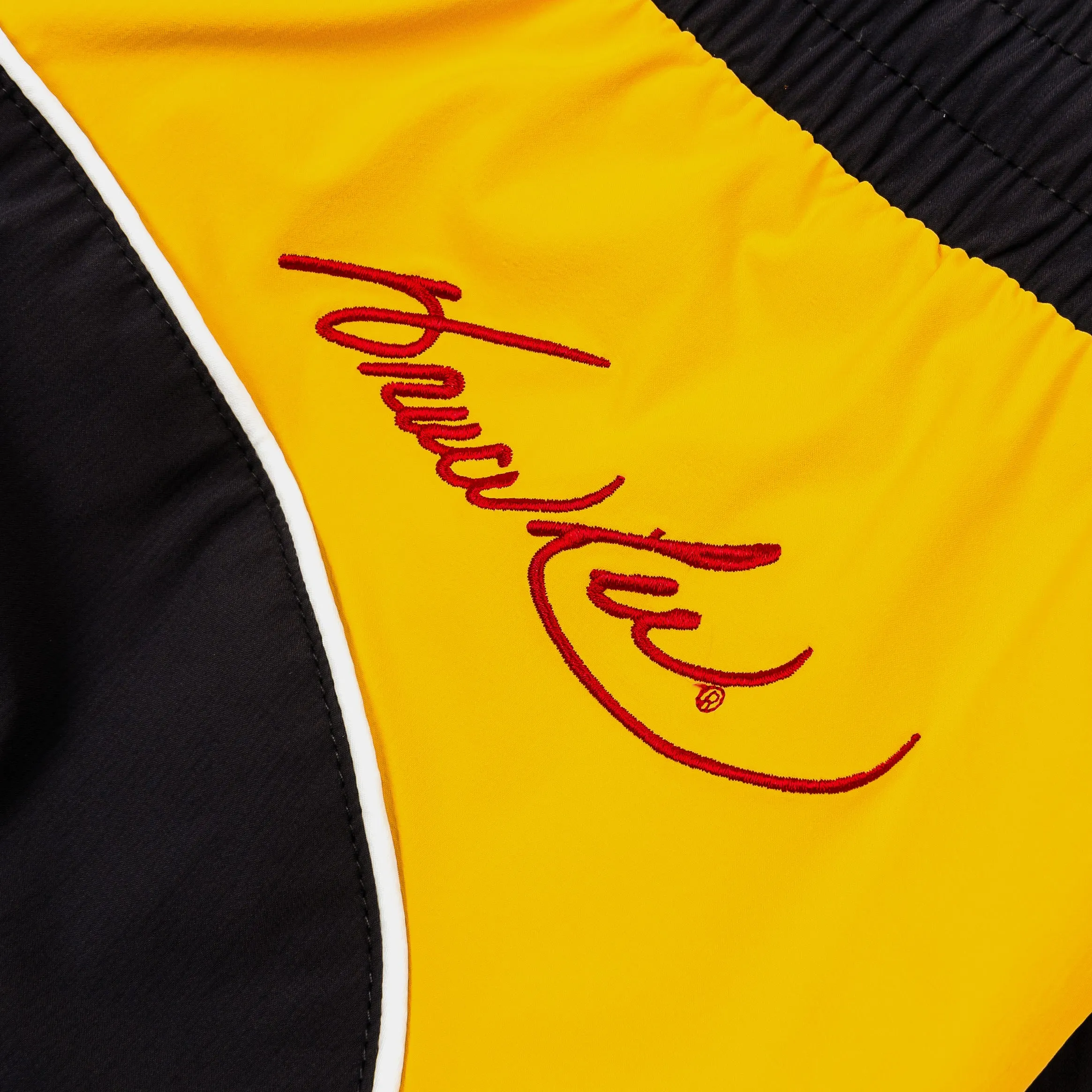 SP x Bruce Lee Be Water Track Mens Pants (Black/Yellow) Sporty Comfort Wear Minimalist Fit