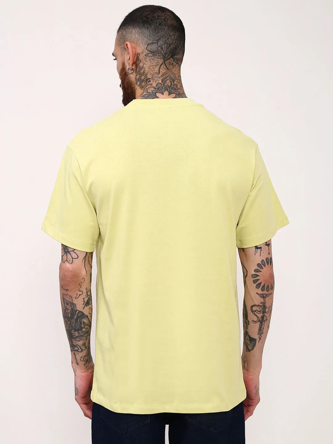 Relaxed Layers Men's Yellow Solid Typography Embossed Relaxed Fit Cotton T-Shirt