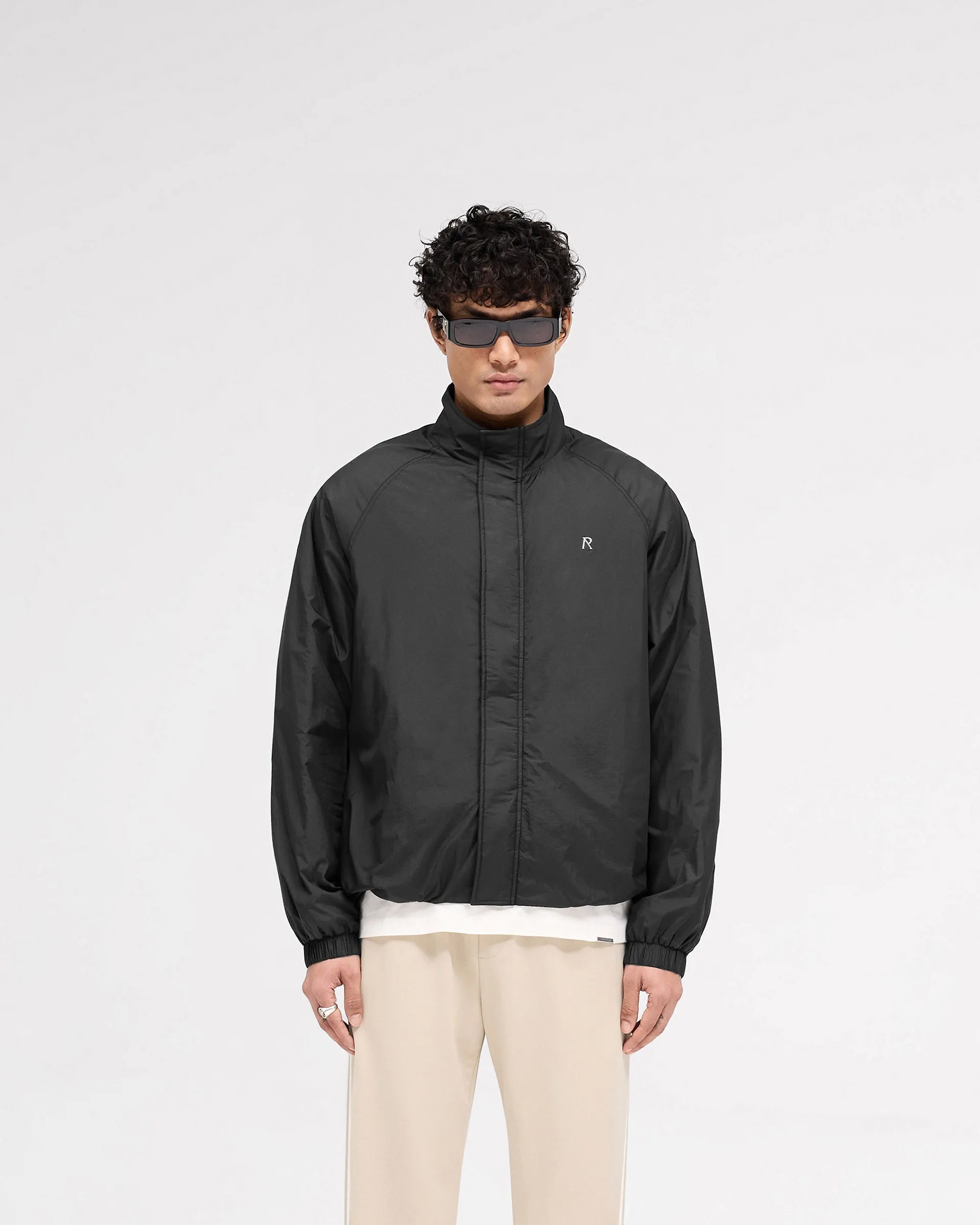 Funnel Neck Jacket - Black Water Resistant Drop Tail Hem