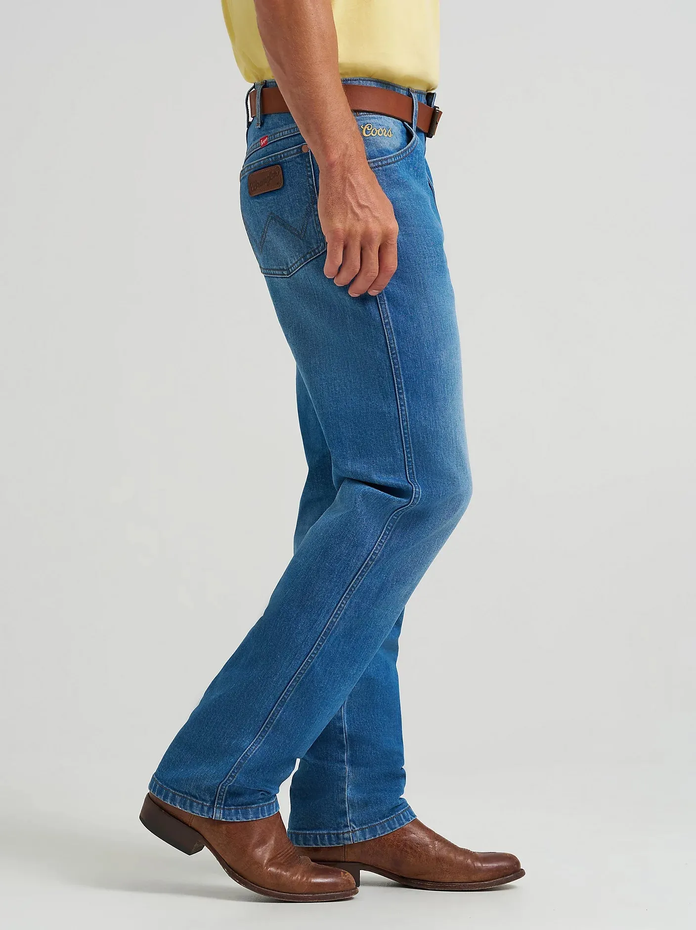 Soft Touch Clean Piece Wrangler x Coors Men's 13MWZ Cowboy Cut Jean in Golden Blue