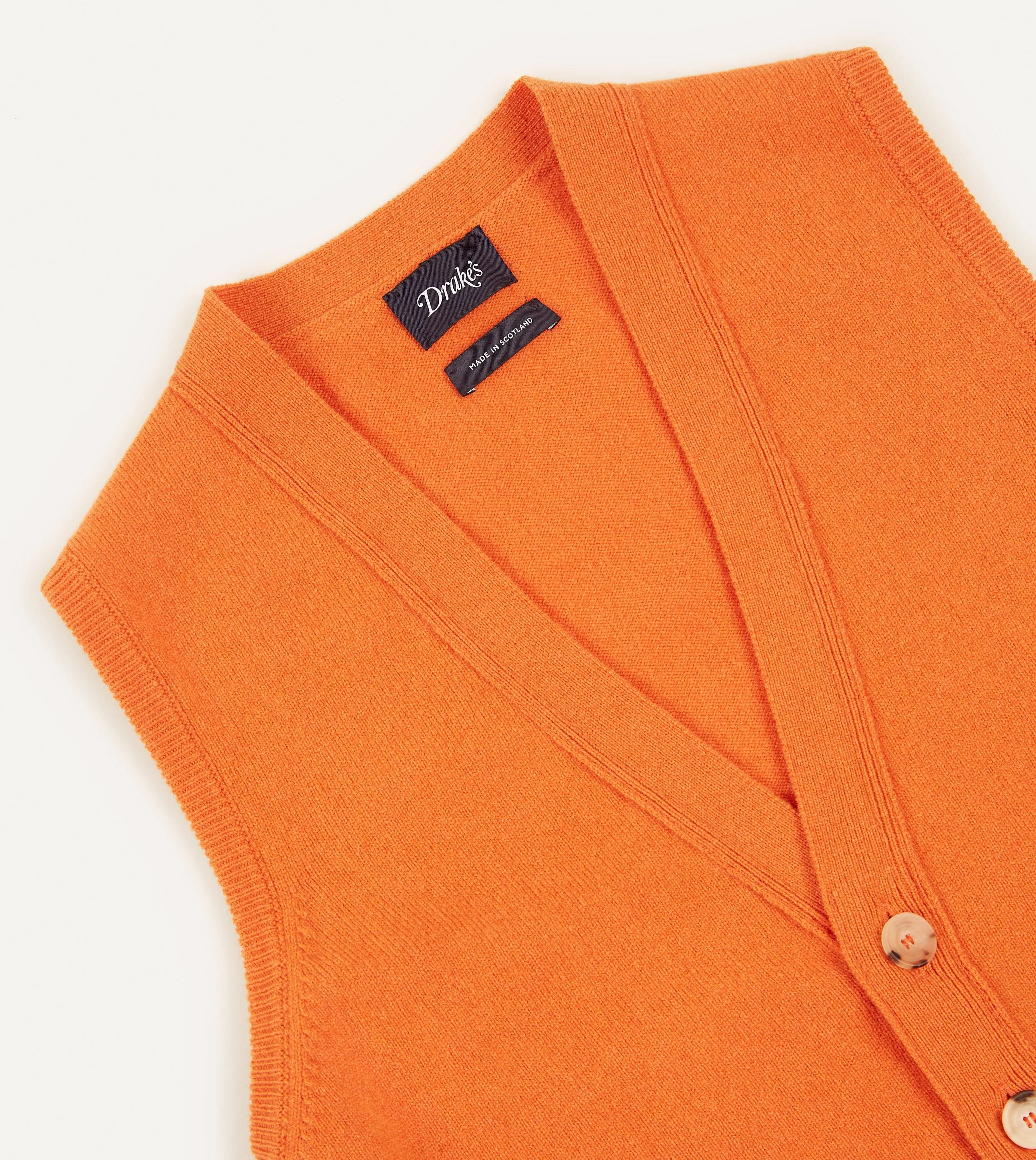 Orange Lambswool Sleeveless Cardigan Ventilated Mesh Panels Airflow Channel Weave